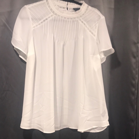 torrid Tops - 3/$10 Torrid white flutter sleeve top.